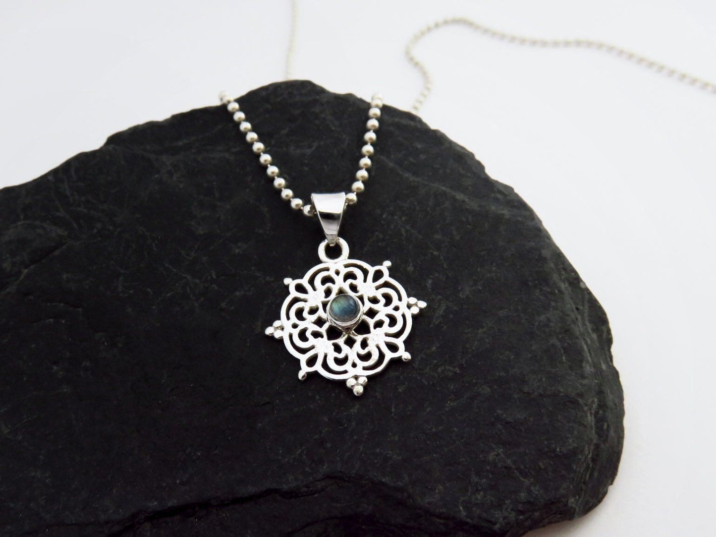 small filigree pendant with labradorite made of silver