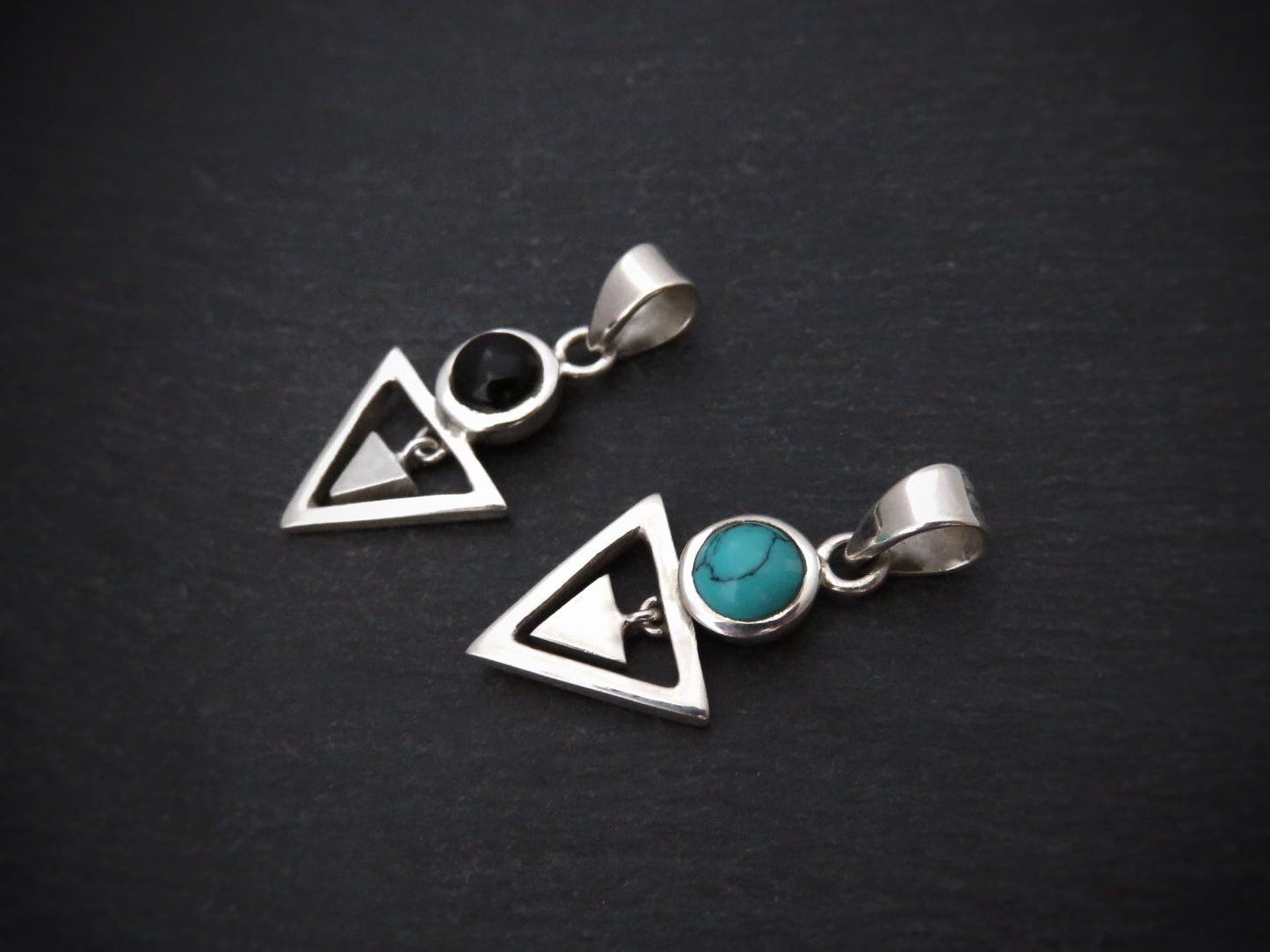 Pendant with stone and small dangling triangle