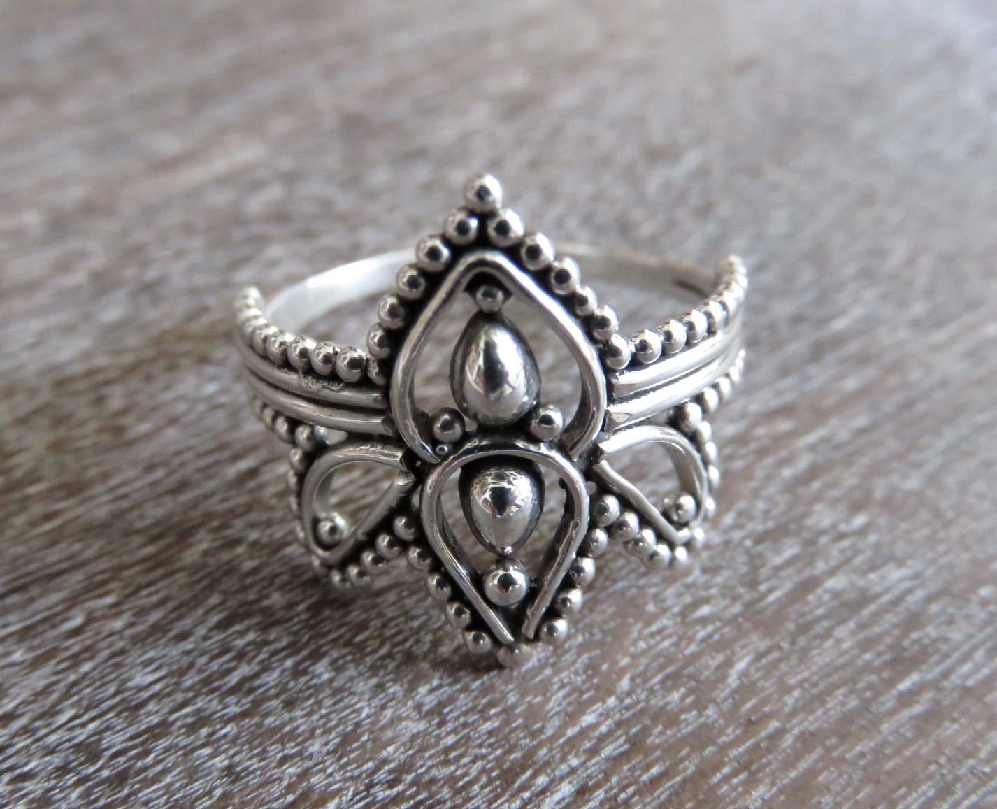 playful ring decorated with silver dots