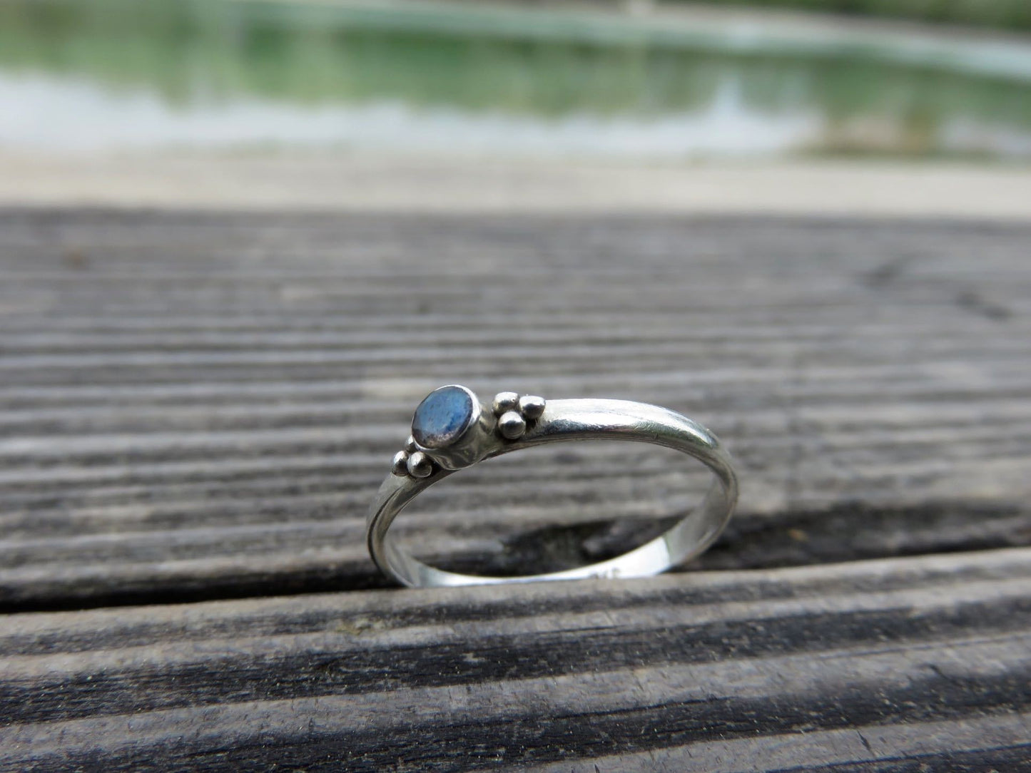 Ring with dots and small stone made of silver