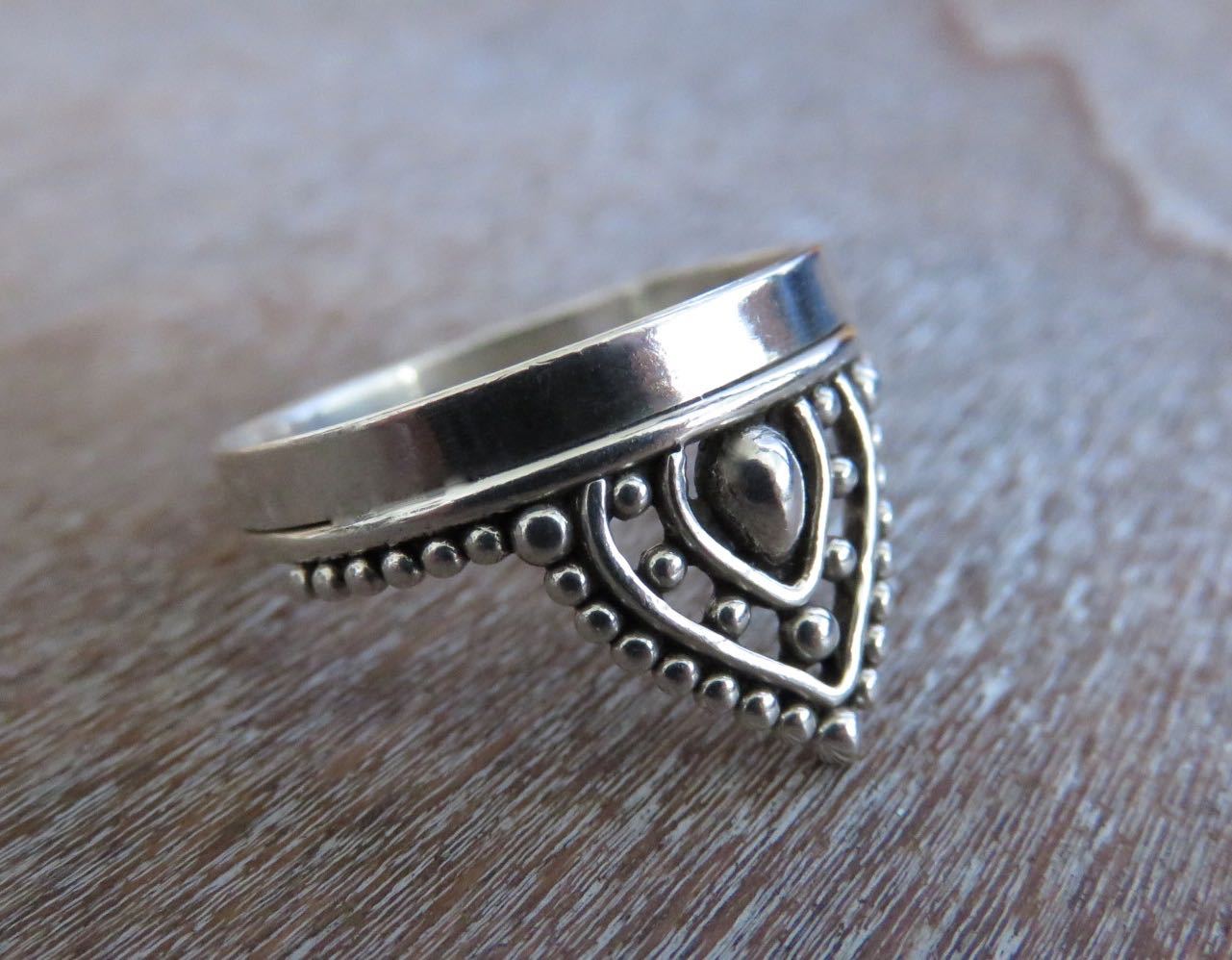 playful ring decorated with silver beads