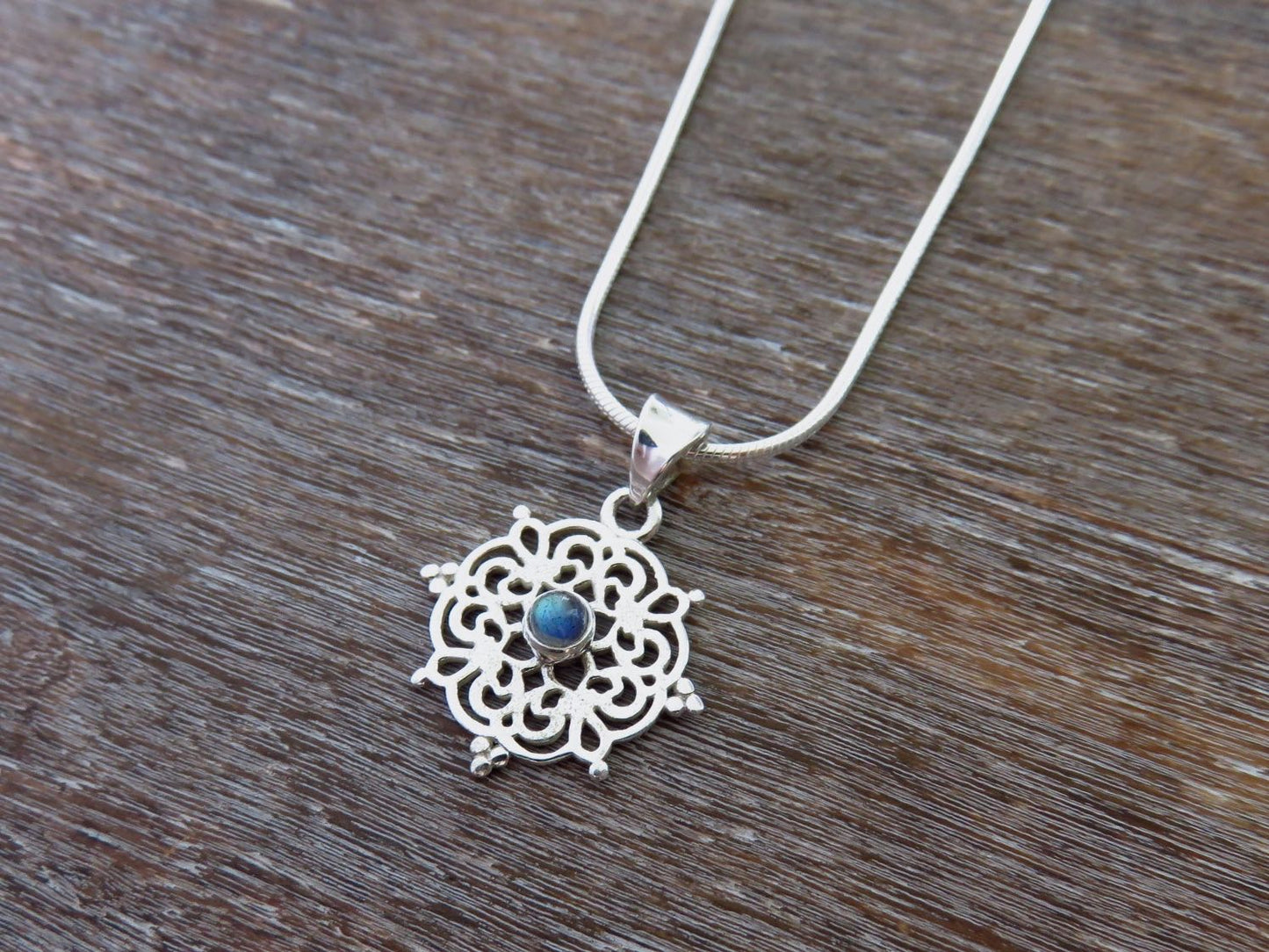 small filigree pendant with labradorite made of silver
