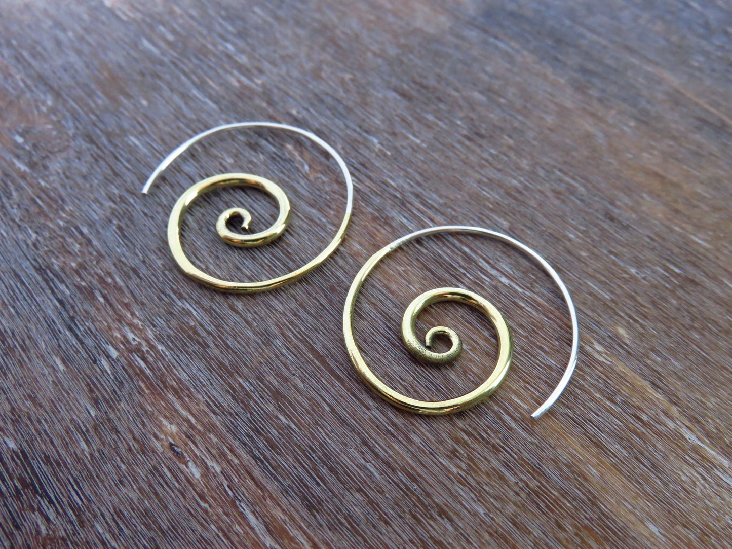 simple spiral earrings made of brass and silver