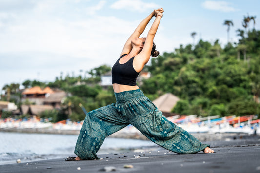 Airy harem pants with a filigree pattern in turquoise