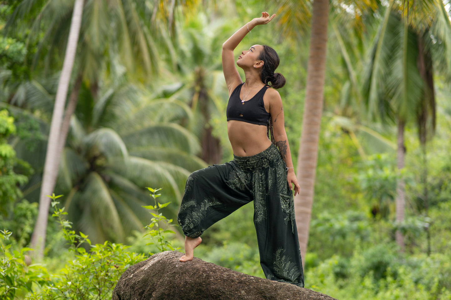 Dark green patterned harem pants with pockets in black