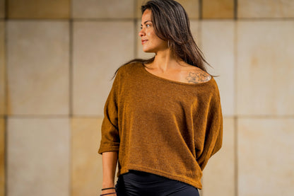 half-length, loose knitted top in blue 