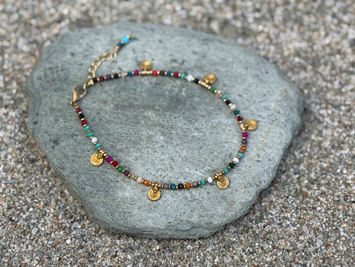 colorful anklet with small spirals made of brass 