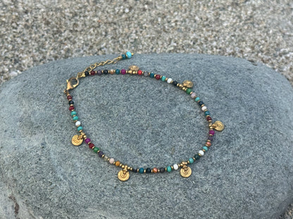 colorful anklet with small spirals made of brass 