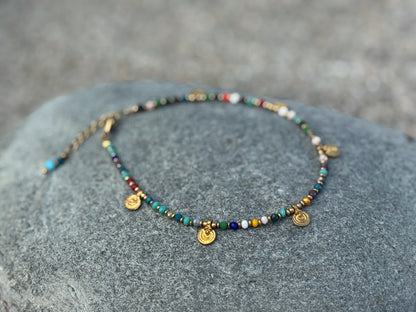 colorful anklet with small spirals made of brass 