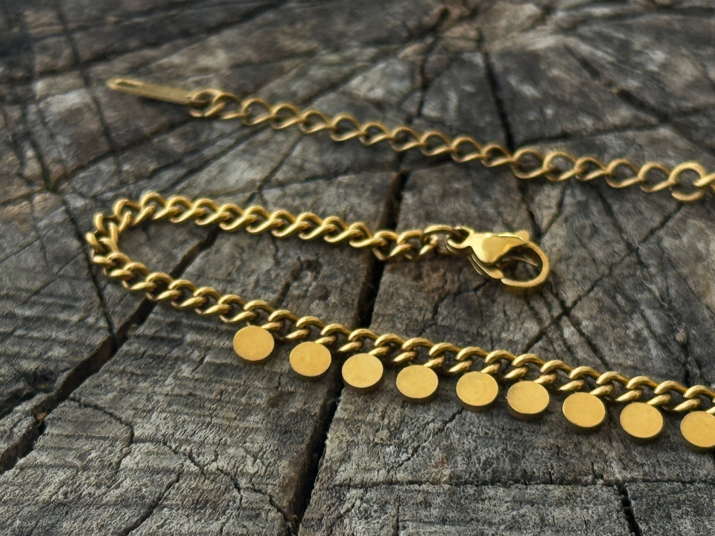double row anklet made of colored beads and spirals 