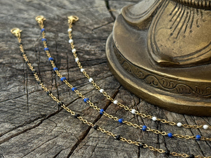 double row anklet made of colored beads and spirals 