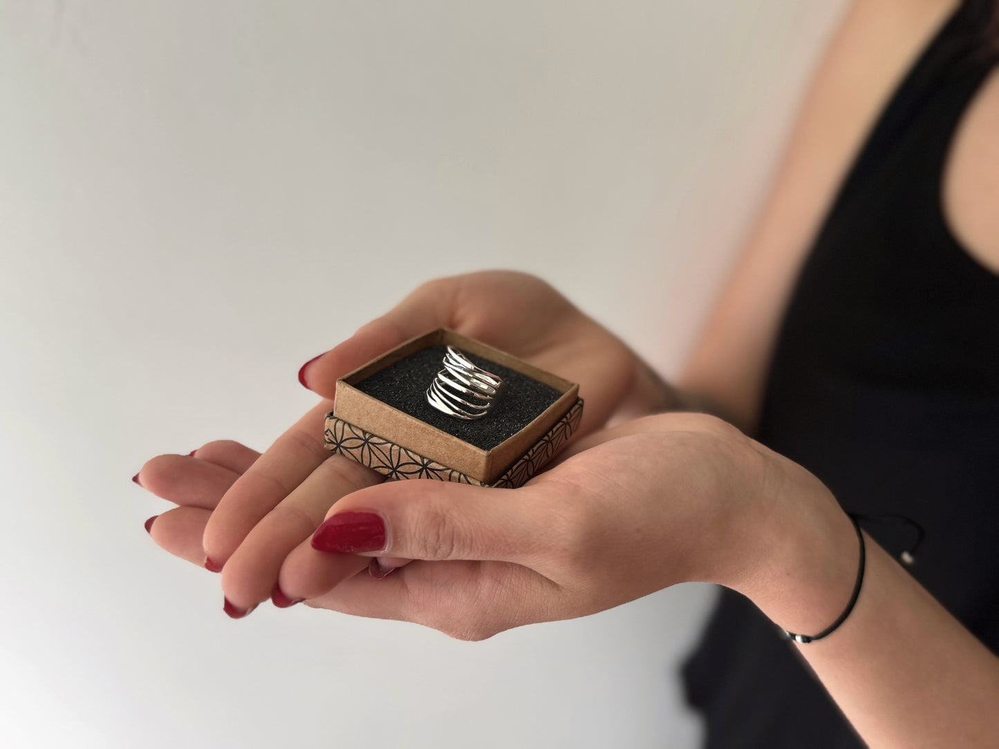 playful ring decorated with silver dots