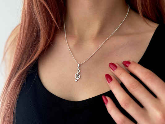 Ball chain with small treble clef made of silver
