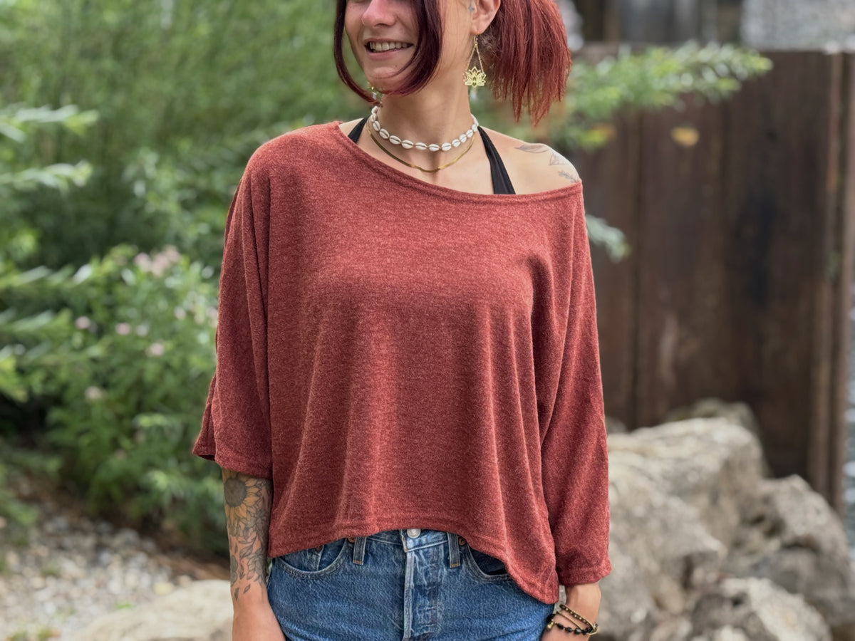 half-length, loose knitted top in blue 