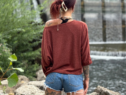 half-length, loose knitted top in blue 