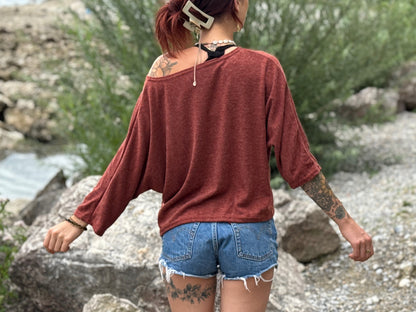 half-length, loose knitted top in blue 