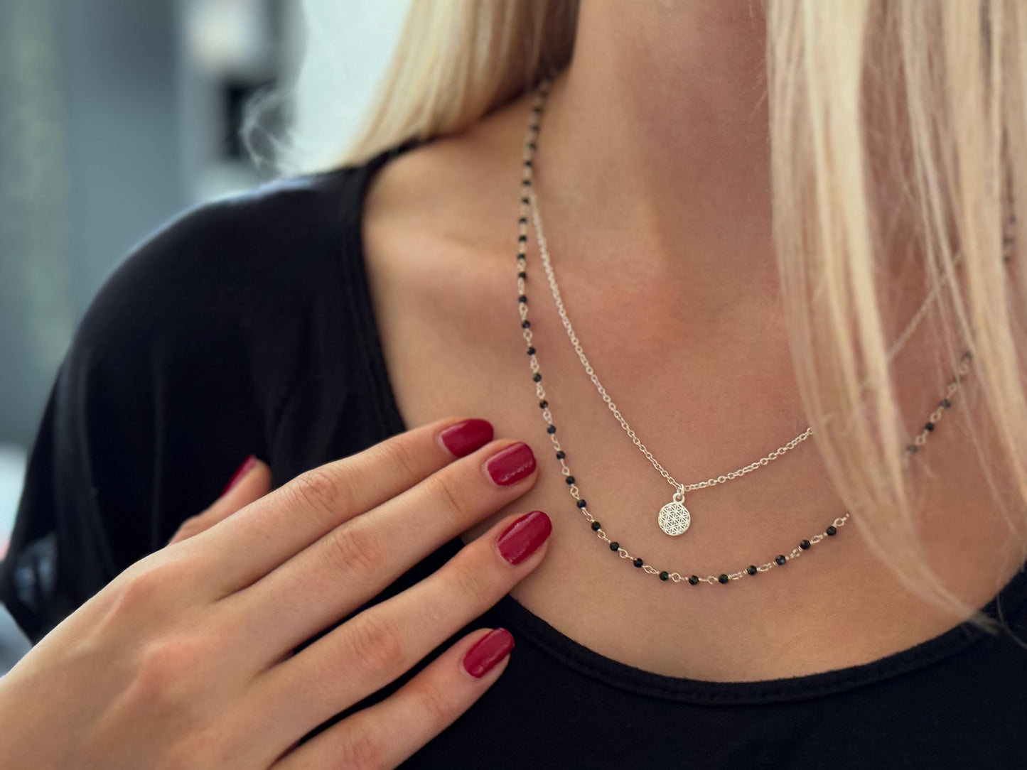 Silver necklace with small tourmaline stones and flowers 