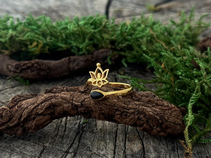 Gold plated toe ring with stone and small flower 