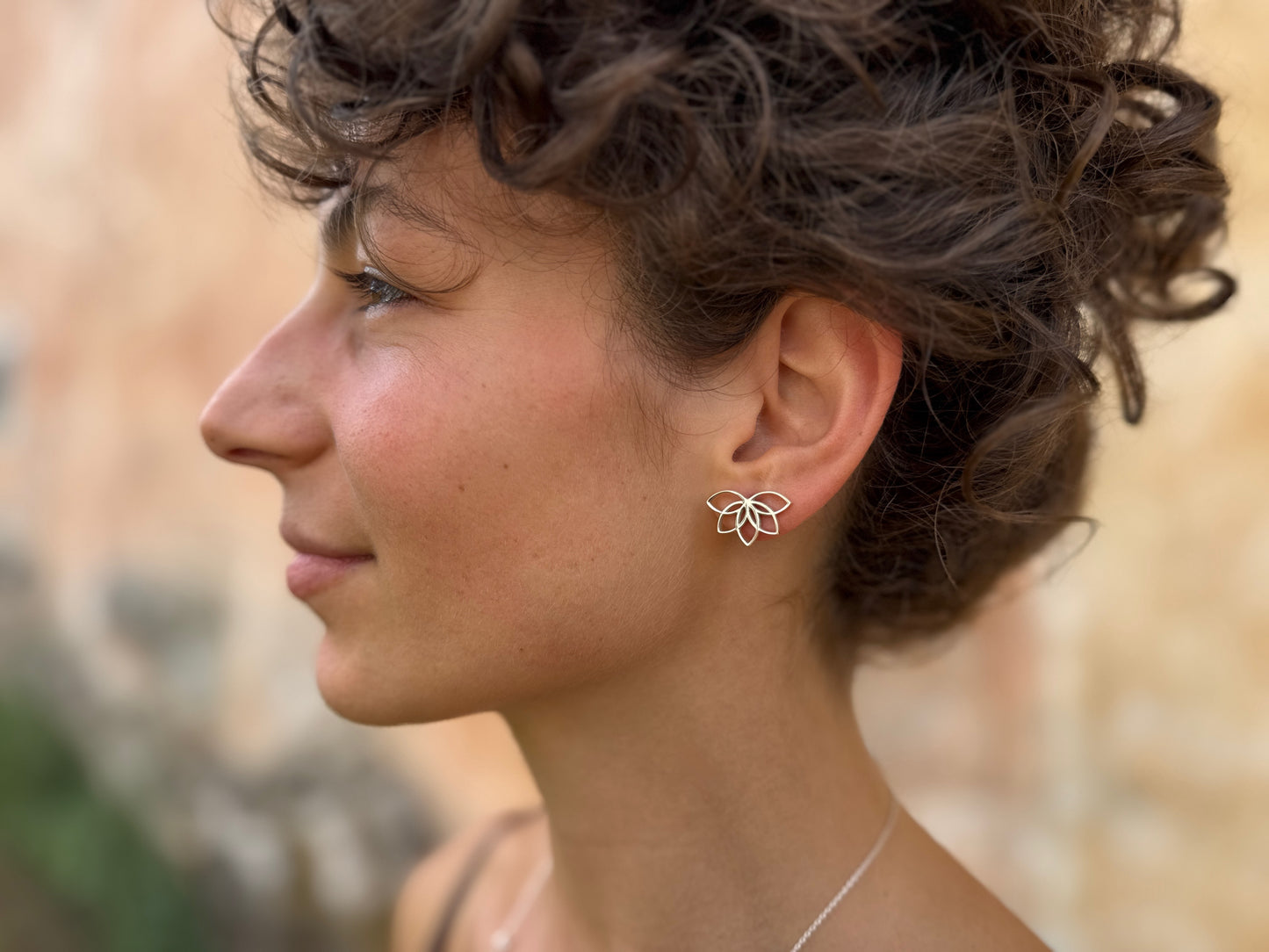 Silver half lotus flower stud earrings 