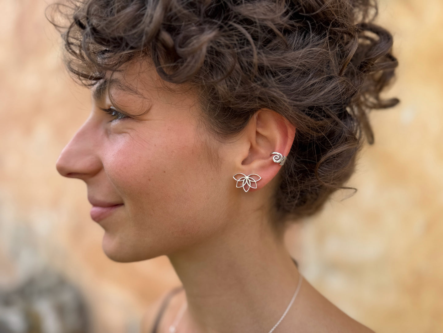 Silver half lotus flower stud earrings 