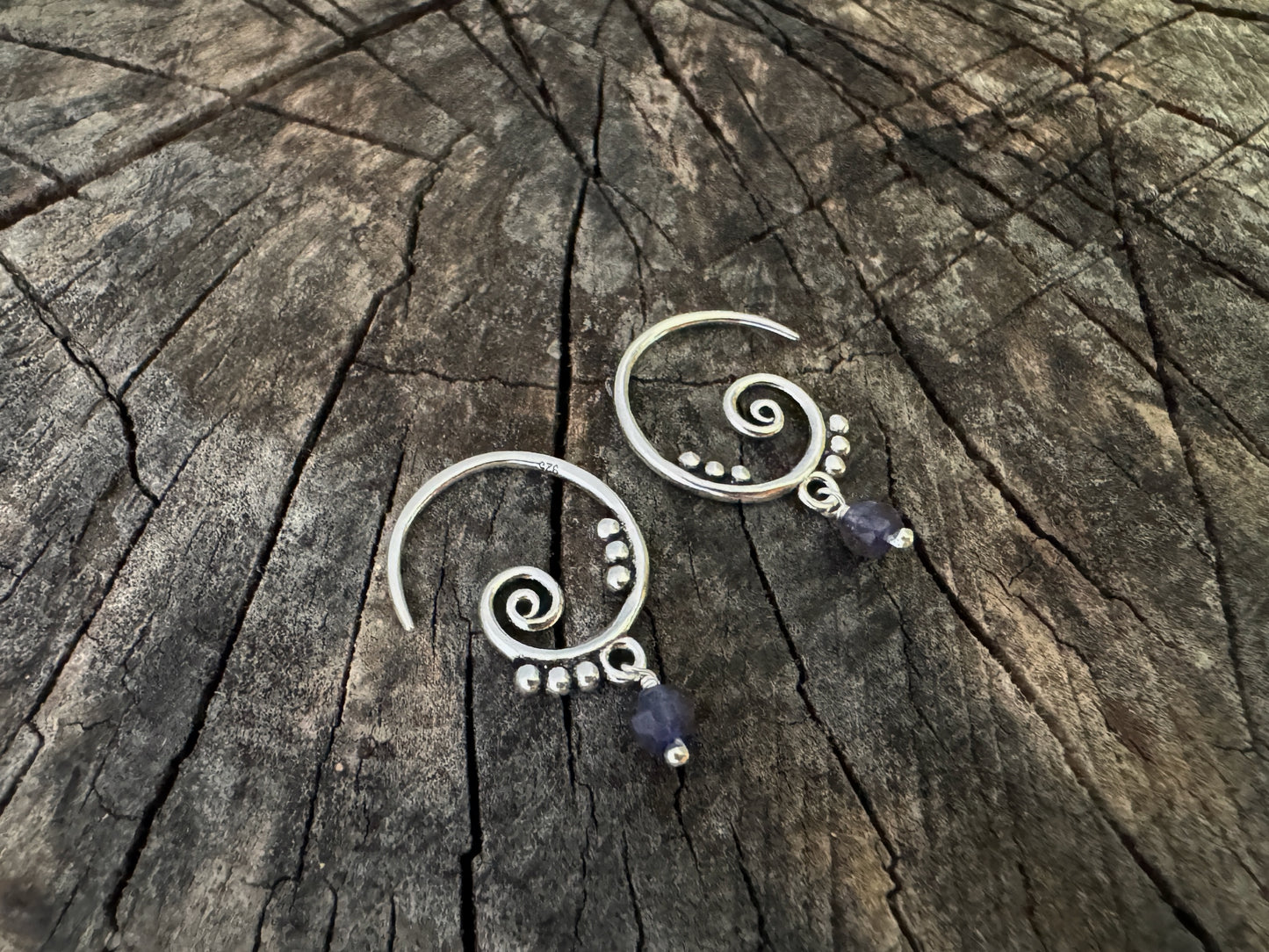 Silver hoop earrings with dangling tourmaline stones 