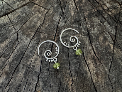 Silver hoop earrings with dangling tourmaline stones 