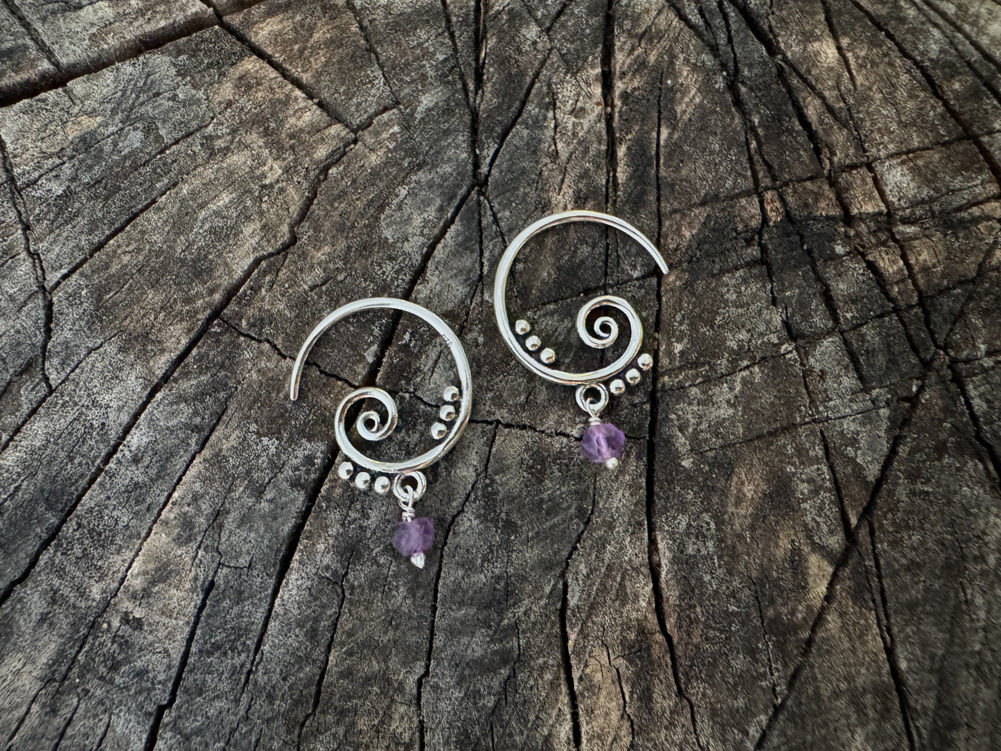 Silver hoop earrings with dangling tourmaline stones 