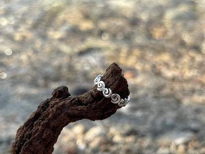 Toe ring with silver spirals 