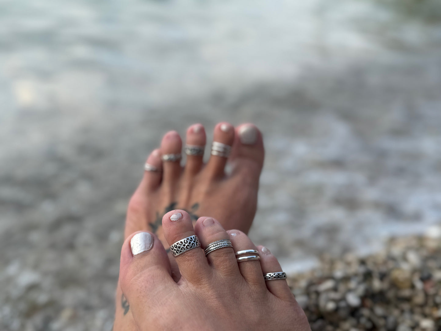 Toe ring with silver spirals 