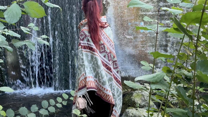 half-length, plain-colored knitted sweater with hood and thumbholes in rosé red 