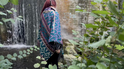 half-length, plain-colored knitted sweater with hood and thumbholes in rosé red 
