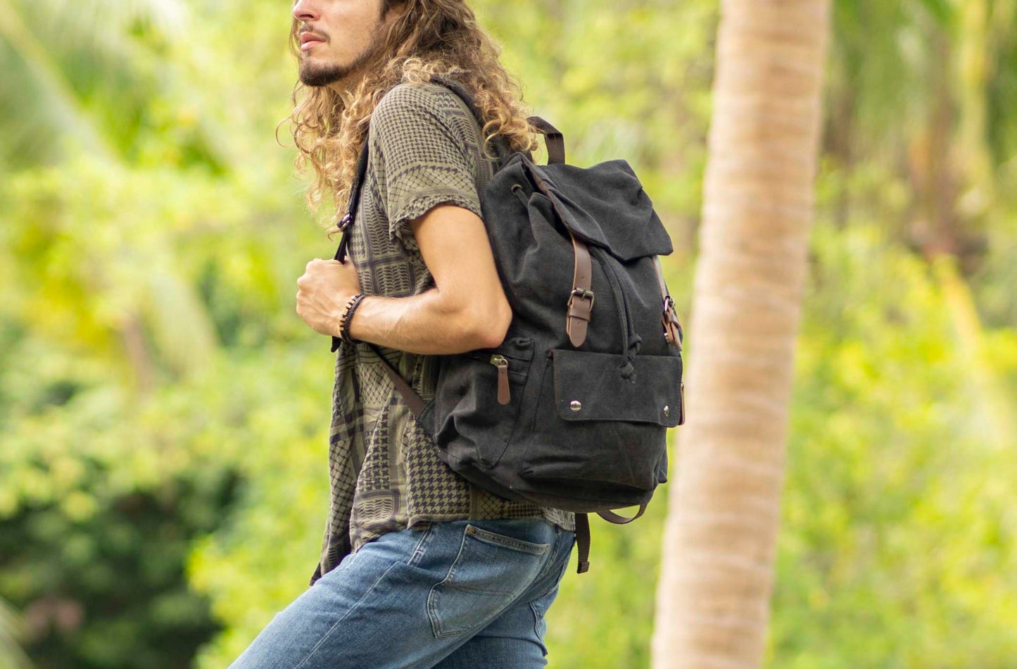 large casual canvas backpack with straps in black 