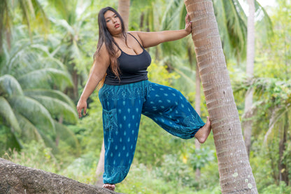 PLUS SIZE airy patterned harem pants in turquoise with pockets 