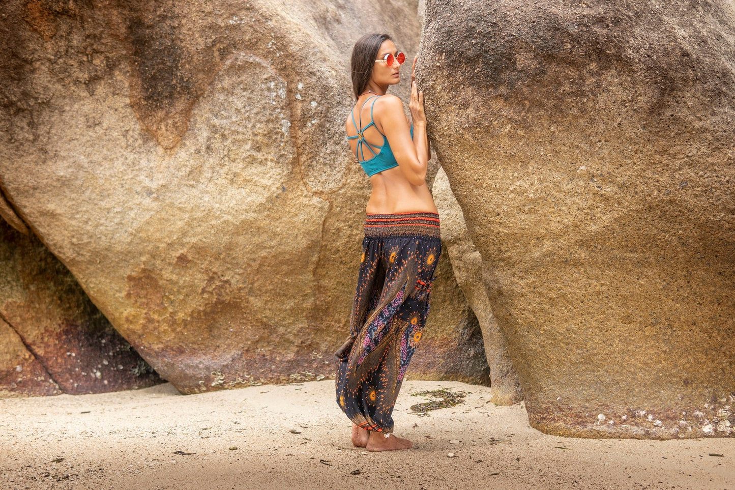 colorfully patterned harem pants with pockets in dark blue