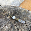 Anhänger Bergkristall mit Operculum mit Spiralen, Pünktchen und kleinem Stein, Messing