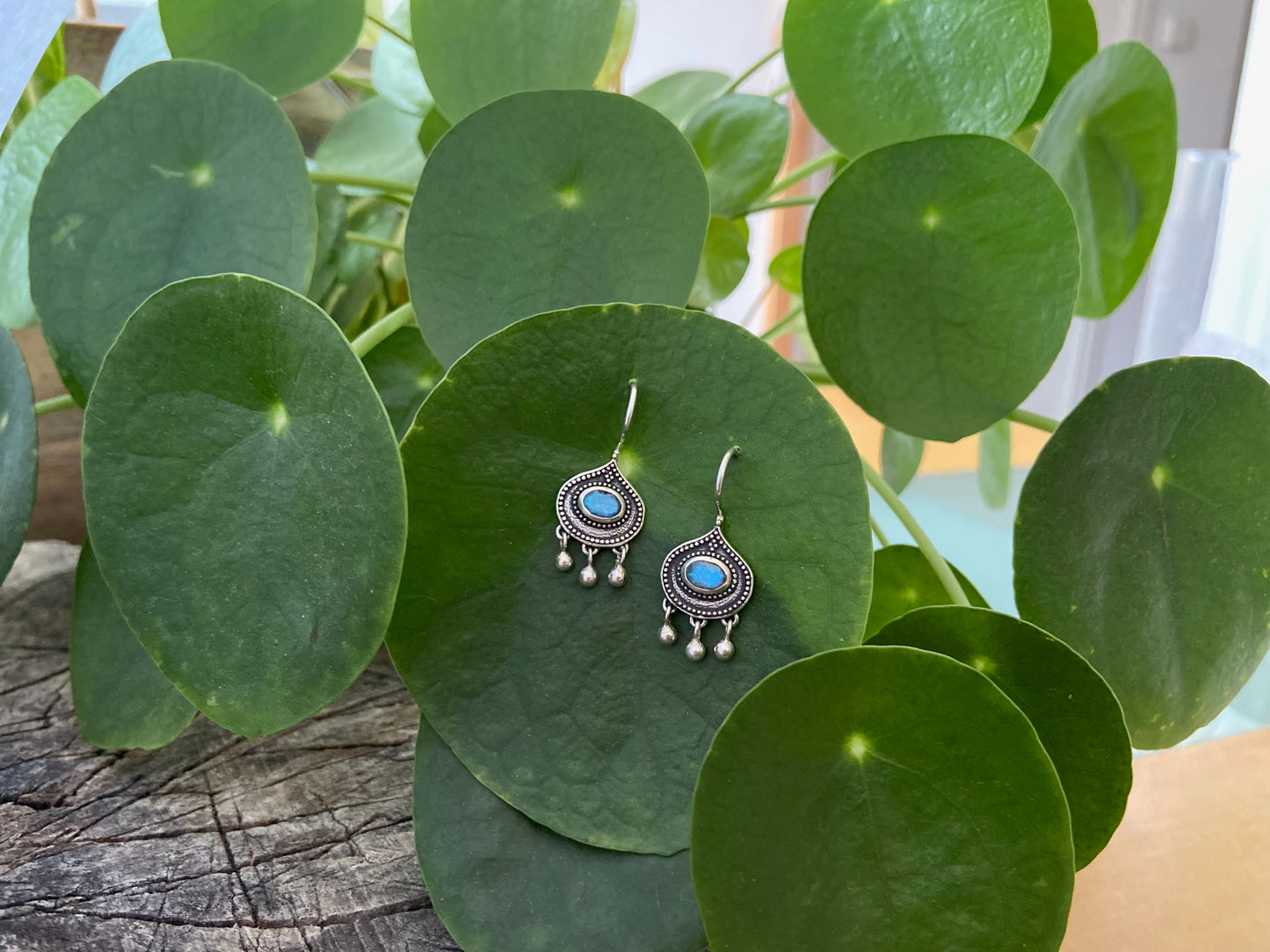 simple silver earrings with faceted oval labradorite stone and dangling beads 