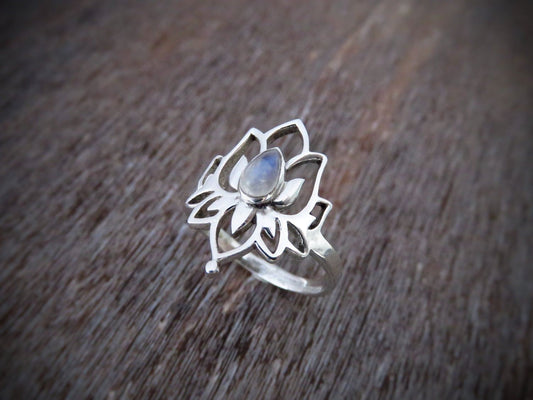Ring with lotus flower and small stone made of silver 