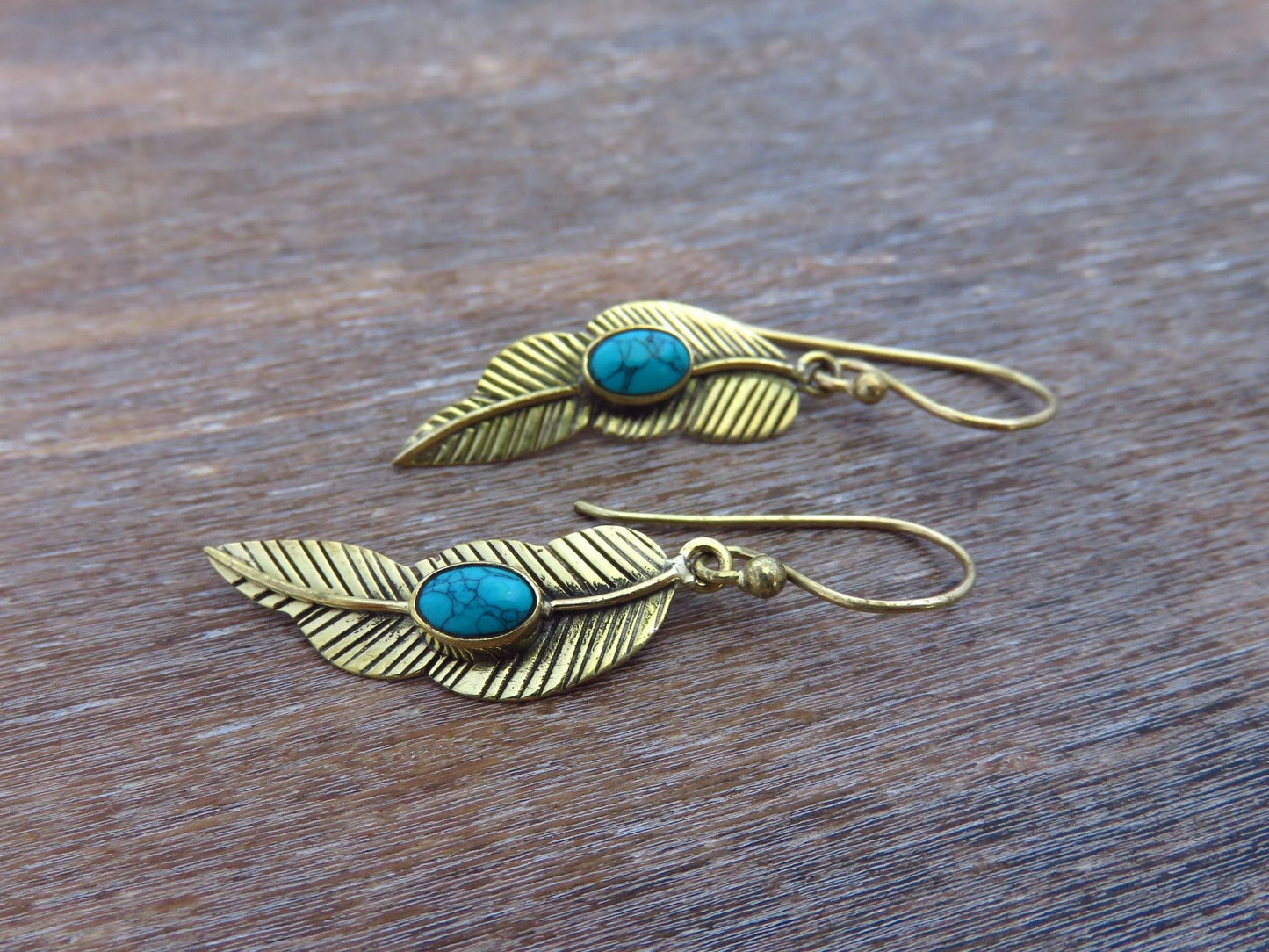 small feather earrings with stone made of brass 