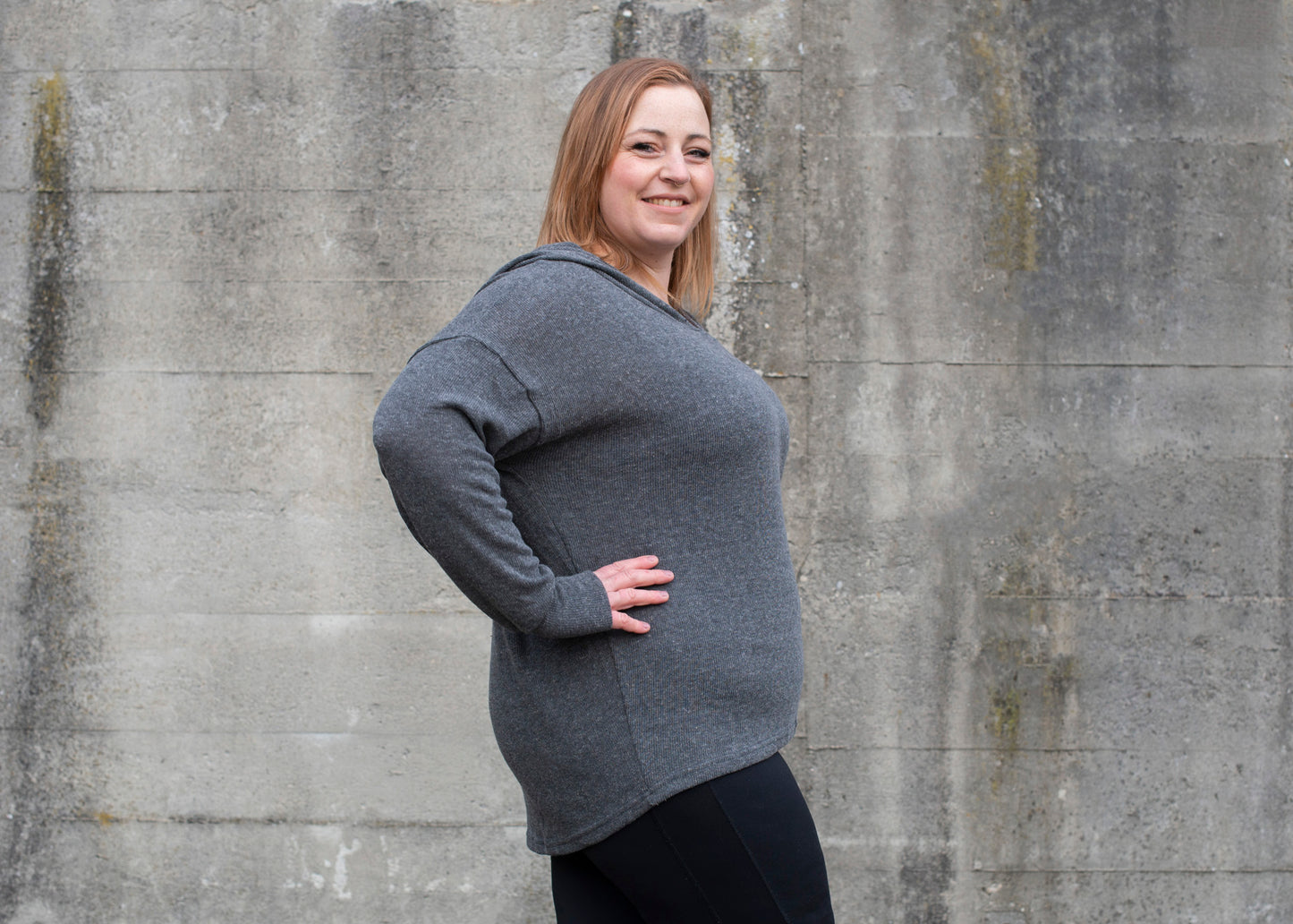 PLUS SIZE, long, plain knitted sweater with a large hood and thumbholes in gray 