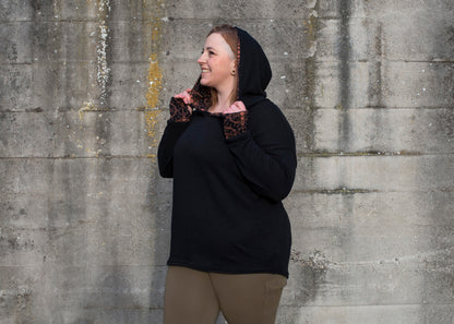 PLUS SIZE, long knitted sweater with a patterned hood and thumbholes in black 