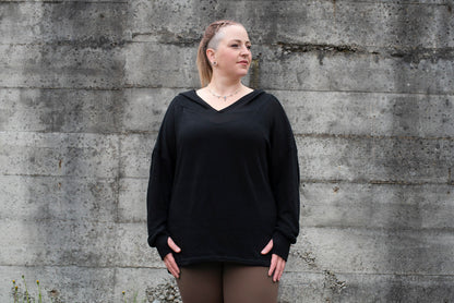 PLUS SIZE, long, plain knitted sweater with a large hood and thumbholes in black 