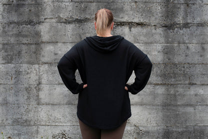 PLUS SIZE, long, plain knitted sweater with a large hood and thumbholes in black 