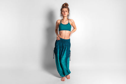 Yoga top with the pattern of the flower of life turquoise/white 