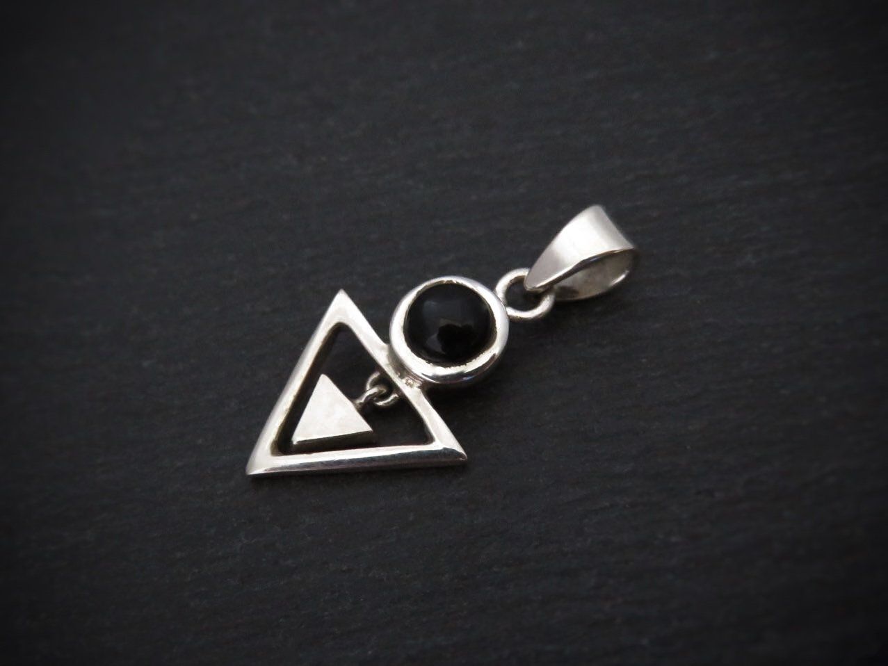 Pendant with stone and small dangling triangle 