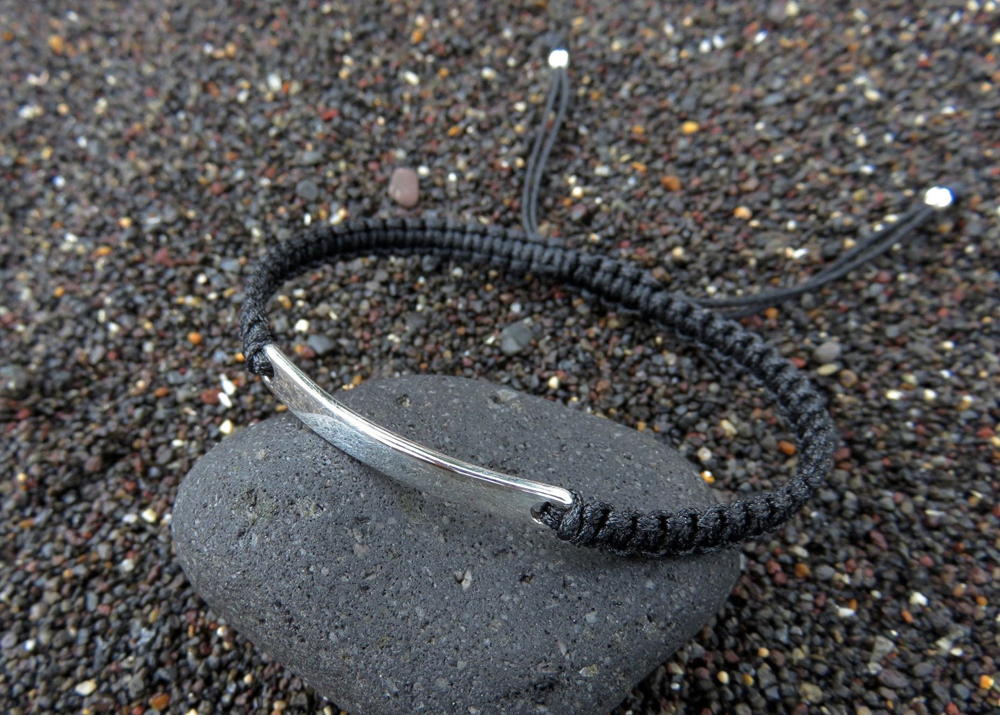 black bracelet for men with silver element 