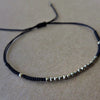 schwarzes Armband mit kleinen Pyrit Steinen