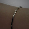 schwarzes Armband mit kleinen Pyrit Steinen