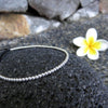 Armband mit kleinen Kügelchen aus Silber Schiebeknoten