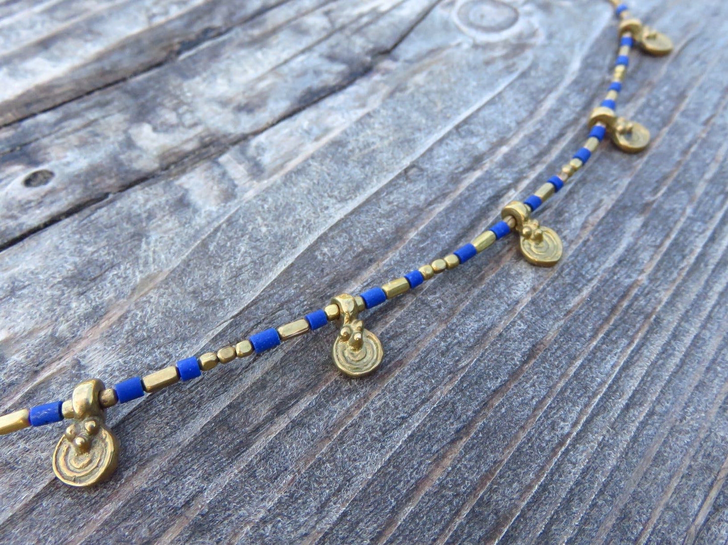 Anklet with small spirals and blue beads 