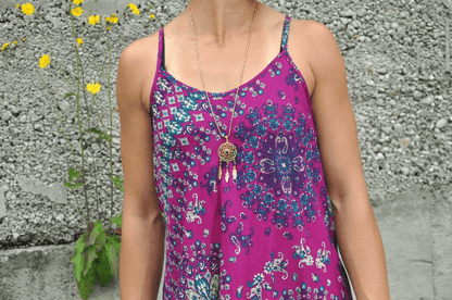 loose summer top with a floral pattern in purple 